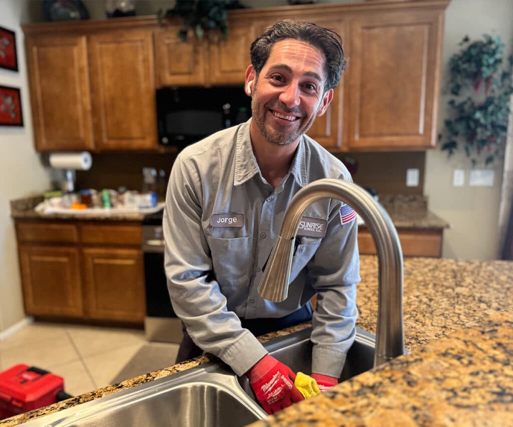 sunrise plumber fixing sink