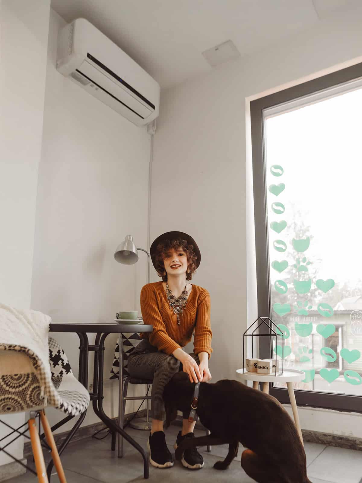 woman petting dog